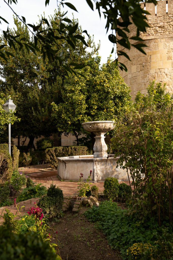 garden with fountain at the alcazar cordoba
