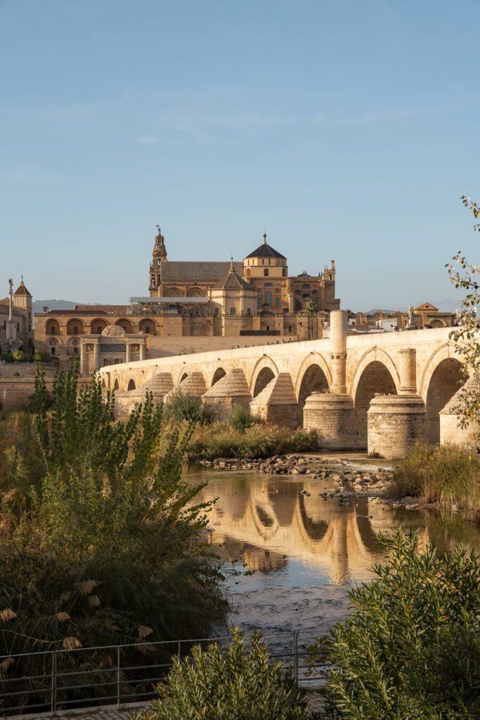 roman bridge and mosque cathedral in cordoba spain