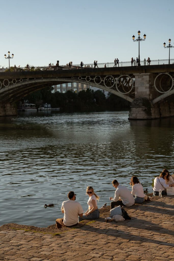 triana bridge in seville spain at sunset