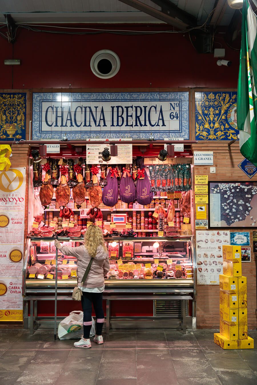 a ham shop at the triana market in seville