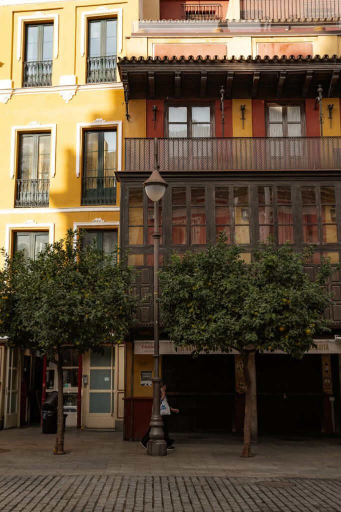 a colorful street in seville