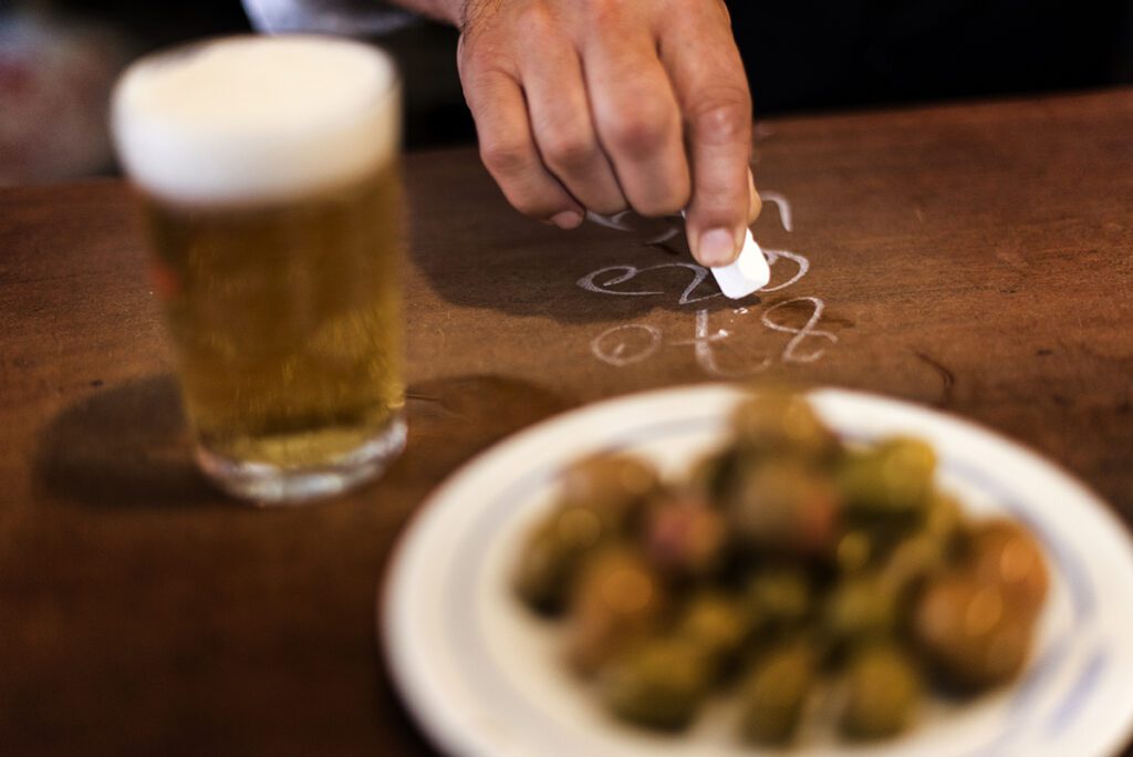tapas with chalk on bar bill