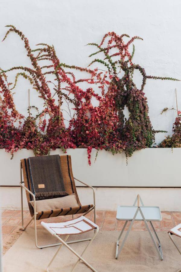 table and chair on terracotta patio