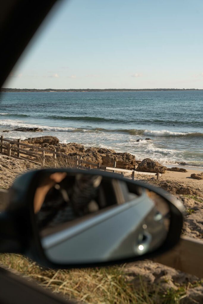 sea view in puglia with car mirror