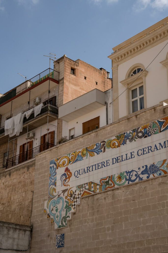 sign and old buildings in grottaglie puglia