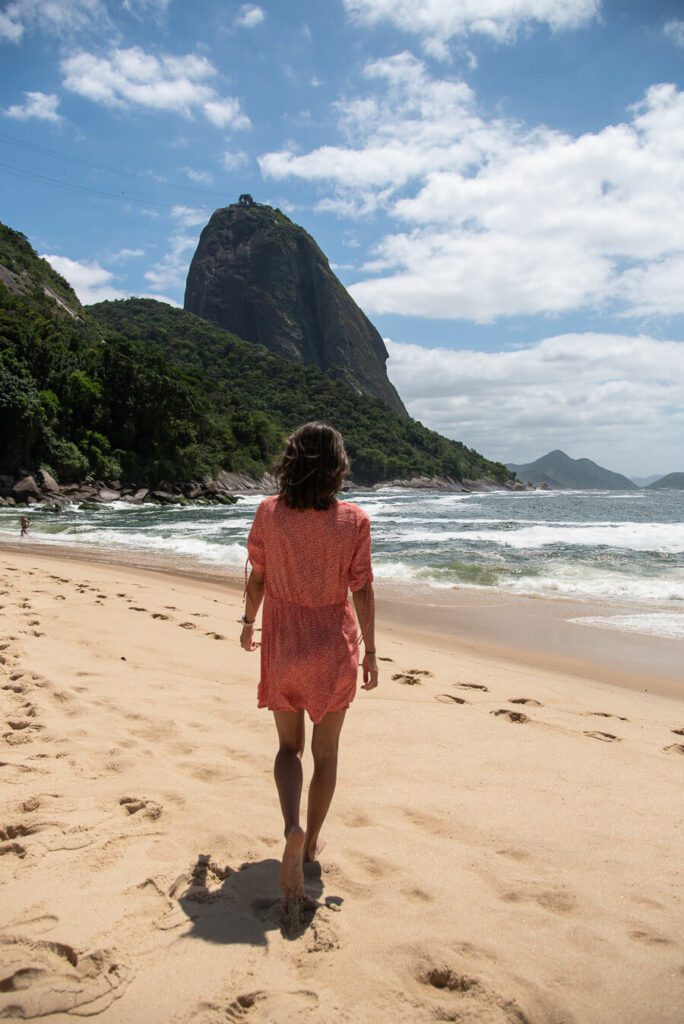 woman at a beach in rio de janeiro on an itinerary
