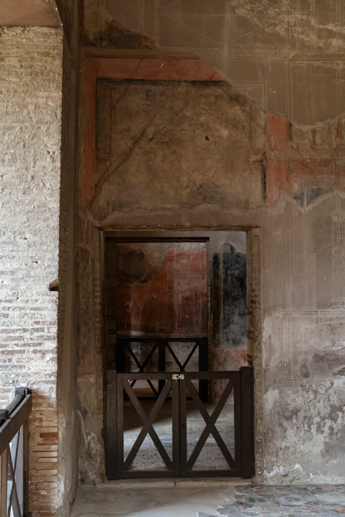 ruins and frescos in a villa in Herculaneum