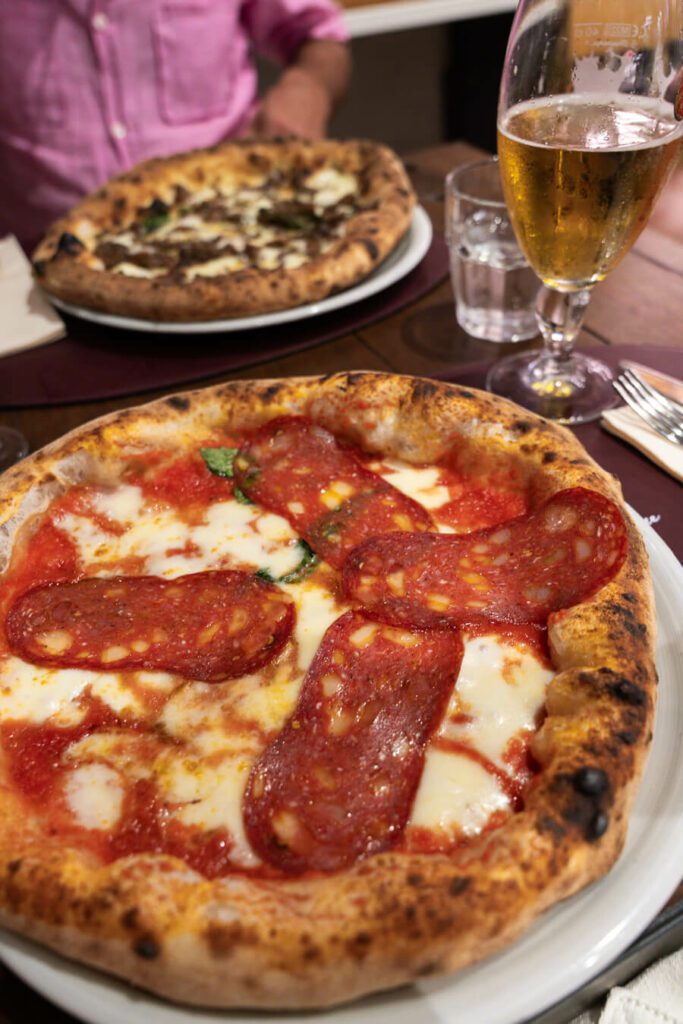 spicy salami and truffle pizza in naples italy