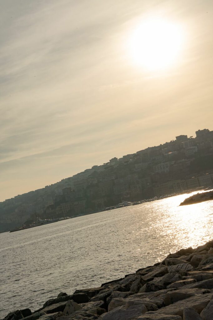 sunset over the sea in naples italy