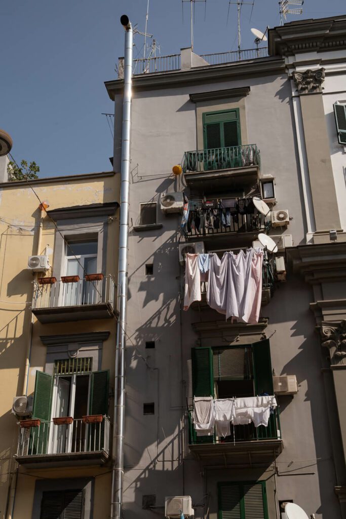 hanging laundry in rione sanita on a naples itinerary