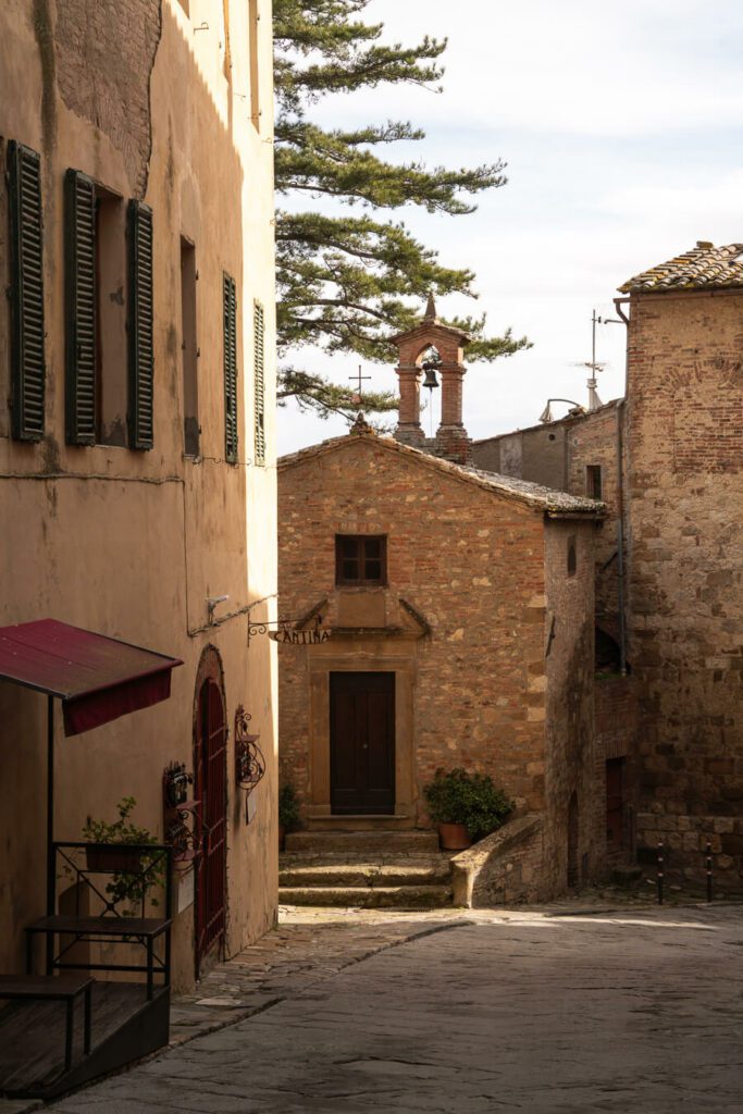 a little church and streetcorner in montepulciano italy