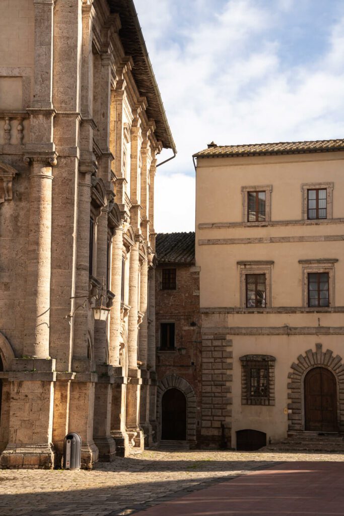 a grand piazza in a tuscan town in italy