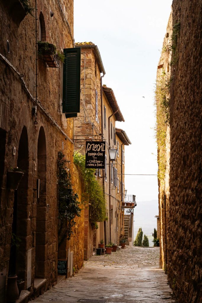 a side street in pienza tuscany made from local stone