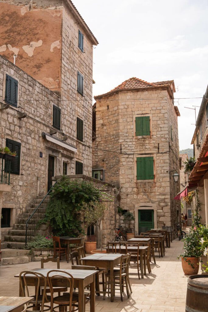 an old alley with restaurant in stari grad hvar
