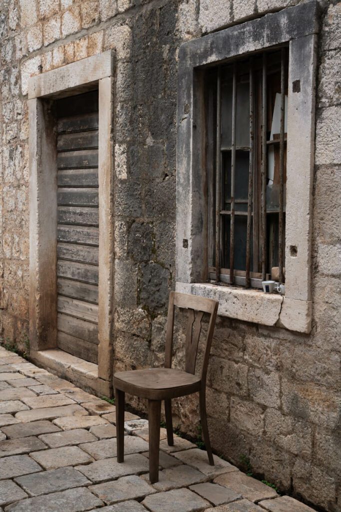 chair in ancient street in stari grad hvar