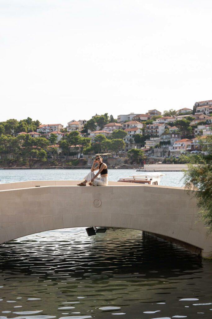 woman, me on a canal bridge in Vrboska Hvar