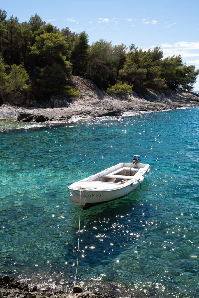 a boat bobbing in the sea in hvar island croatia