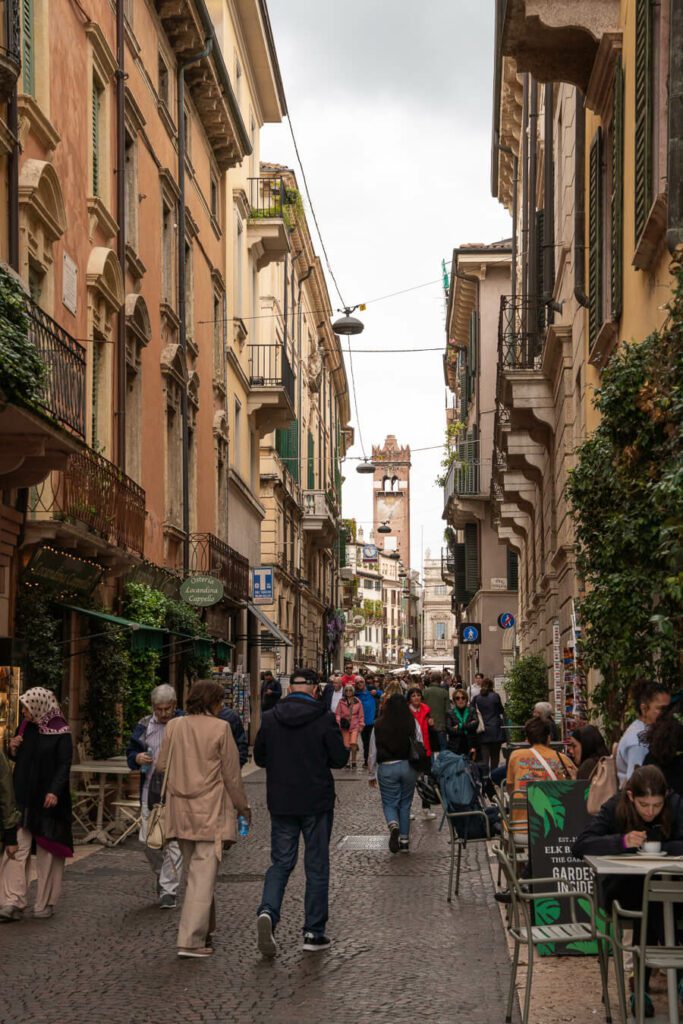 busy pedestrian street on verona italy