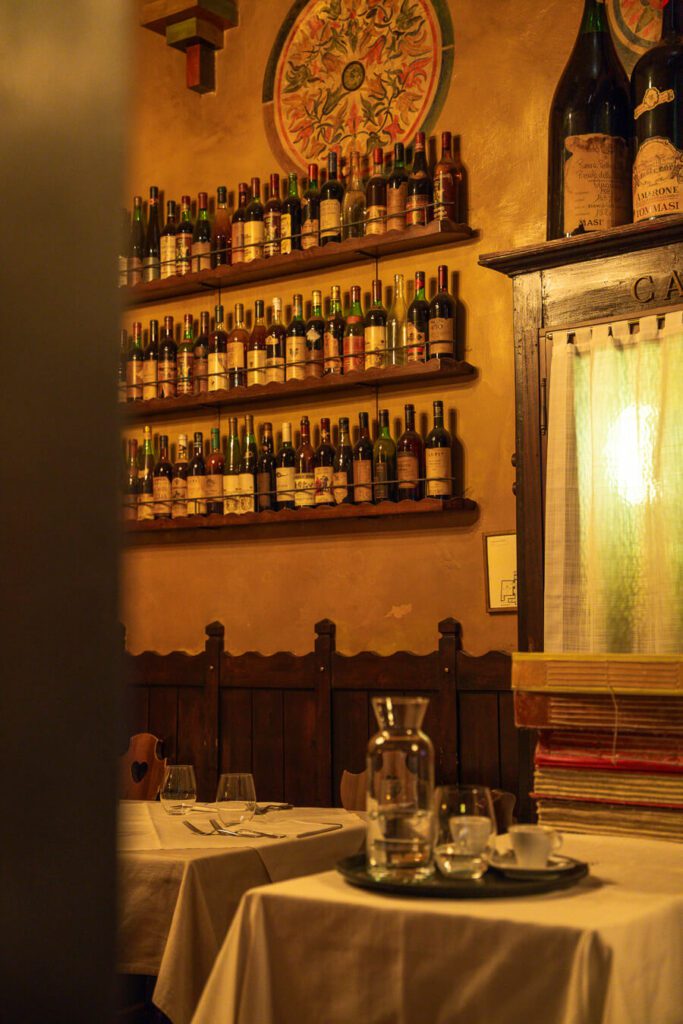 restaurant interior with wine bottles in verona italy