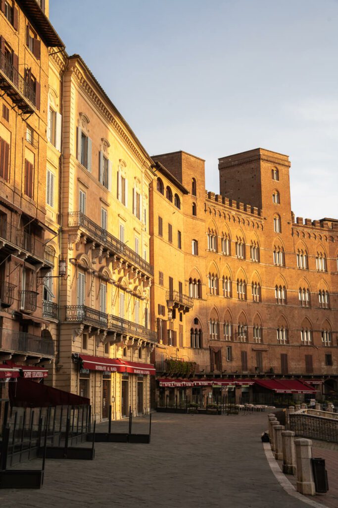 first light on piazza del campo siena italy