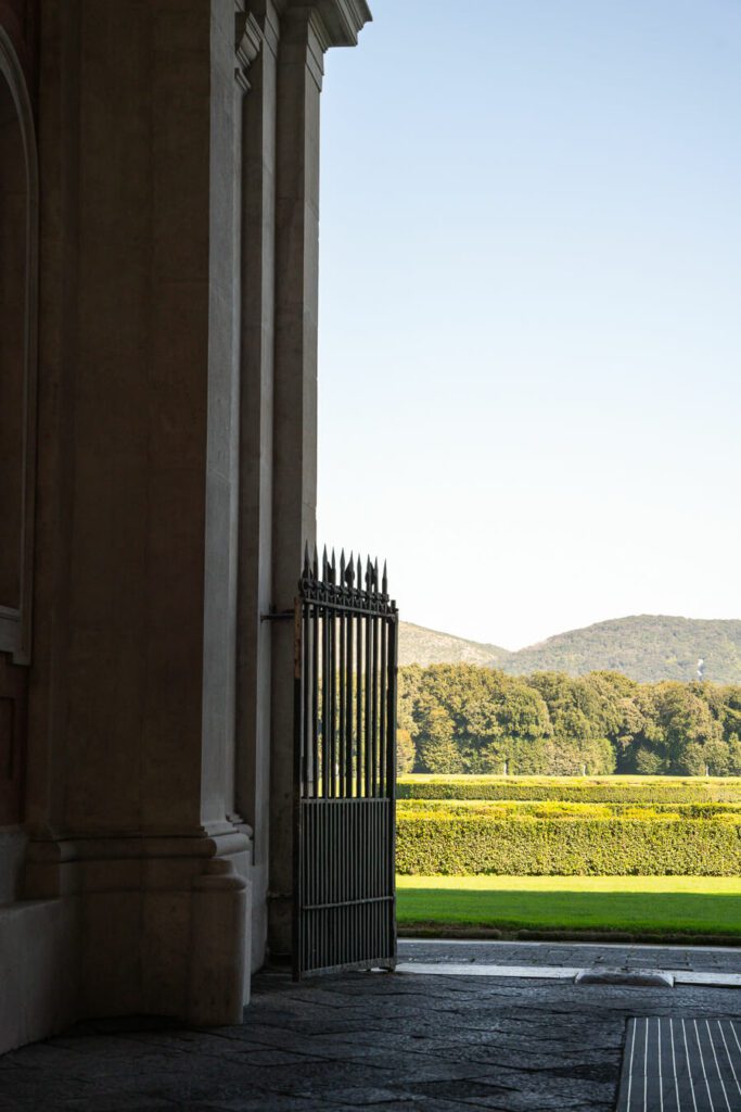 open gate leading to a garden in italy