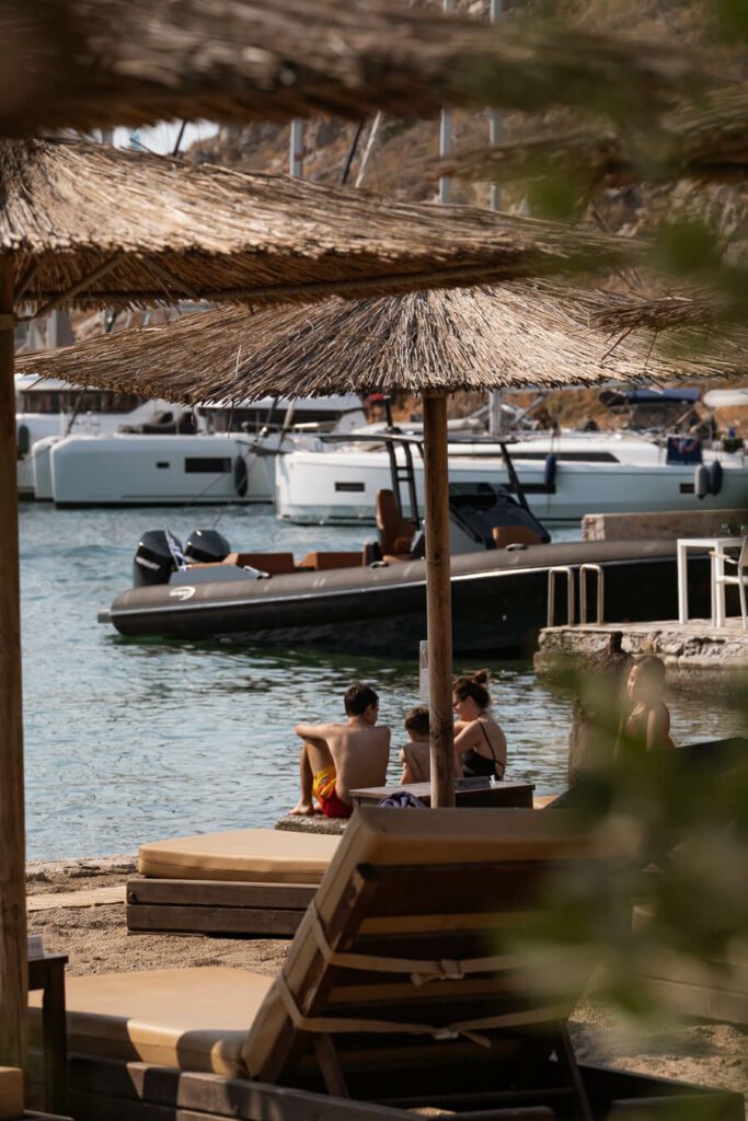 bathers at Mandraki bay beach club