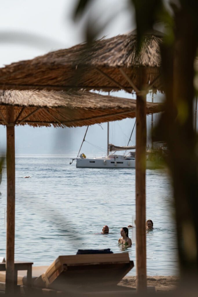 mandraki beach resort beach with yacht