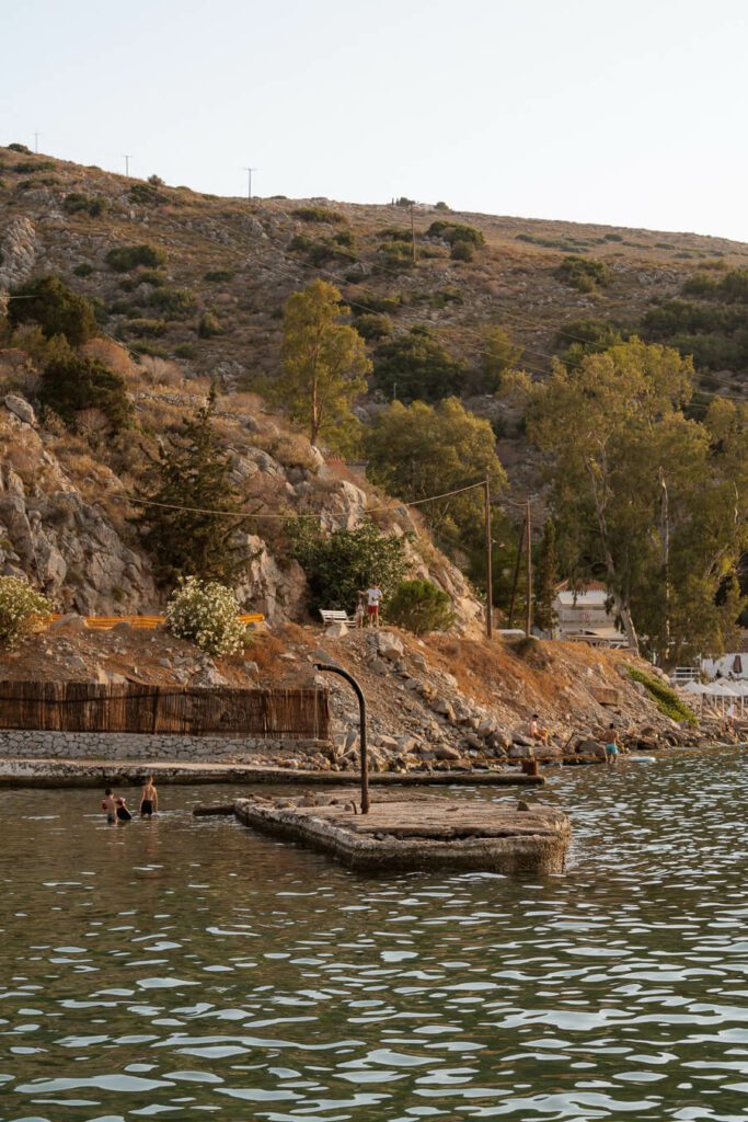Mandraki bay beach bathers