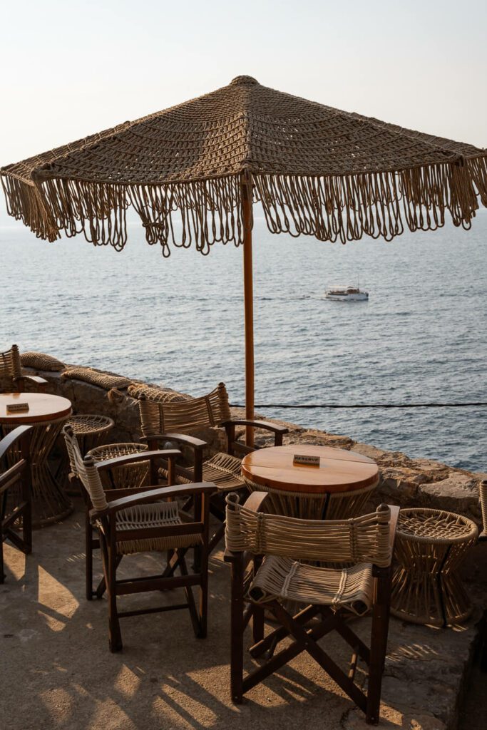 windmill bar in hydra greece at sunset