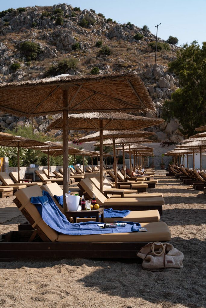 a beach club at mandraki in hydra greece