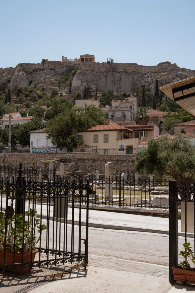 roman agora in athens with acropolis