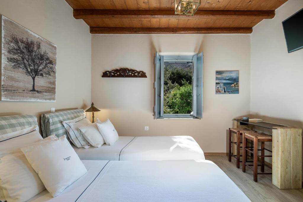 a guest room in luxury hotel in hydra greece