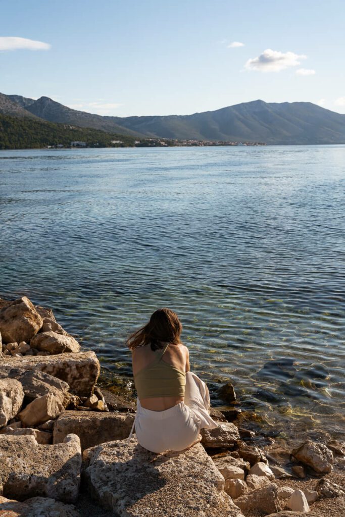 woman, me by the sea in korcula croatia