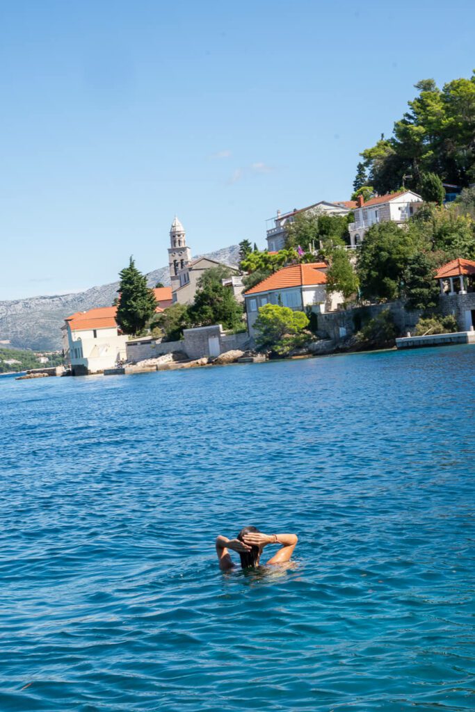 me swimming in a bay in korcula