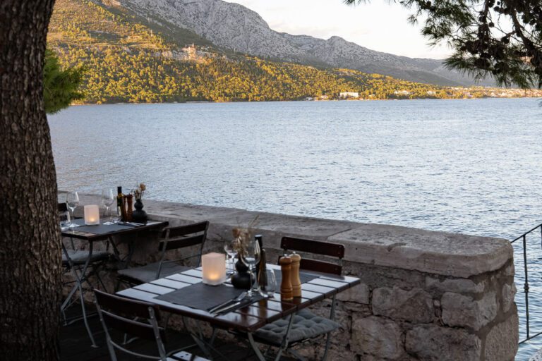 outdoor restaurant seating with beautiful sea views in korcula