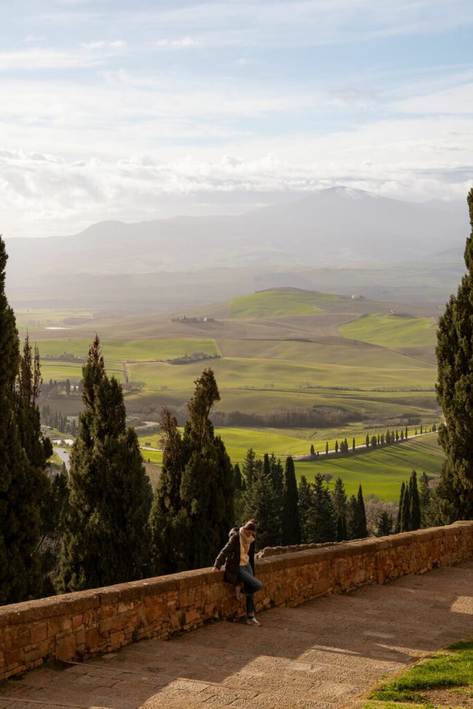 woman me with rolling tuscany valleys in the fall