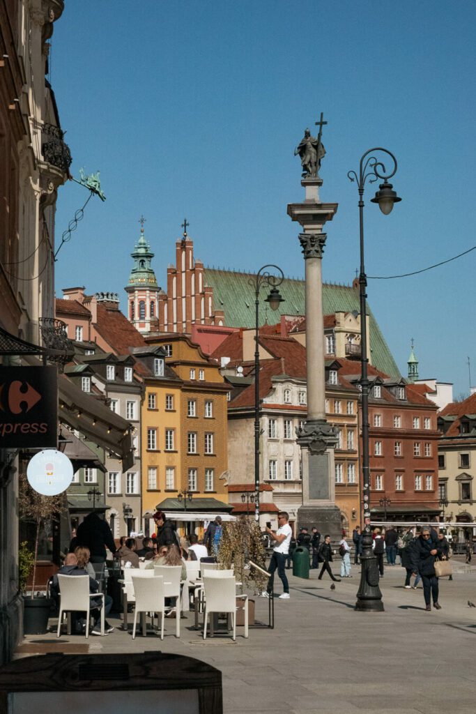 buildings and coloumn in old town of warsaw