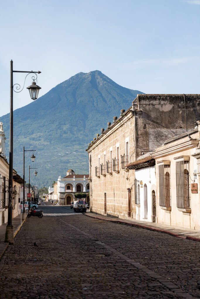 street in antigua guatemala with full volcano view