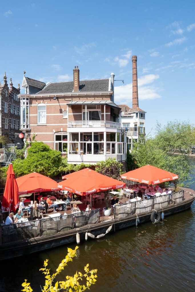 rotterdam west and delfhaven canal corner with cafe